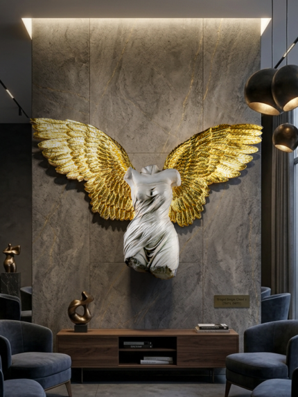 Escultura de angel con alas doradas