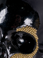 Escultura de craneo negro