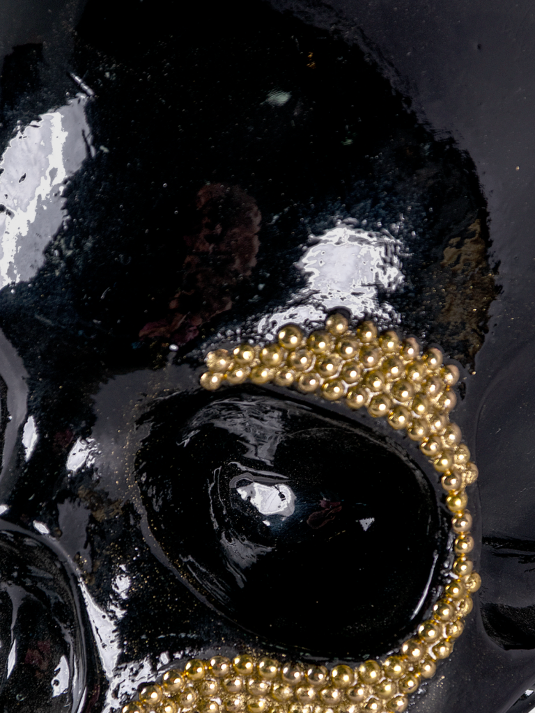 Escultura de craneo negro